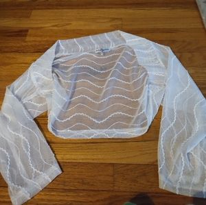 White sequinned cover